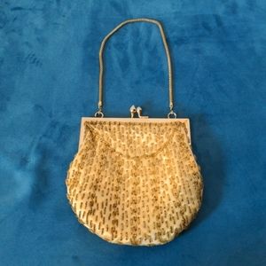 Beaded golden clutch